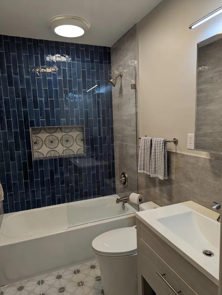 Blue tile bathroom renovation by Cornerstone KB Pro